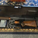 Beretta "NEW" 694 Black DLC 12ga. 32" Sporting Clays gun.
